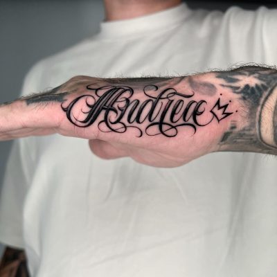 Side hand tattoo by Miguel Da Costa
