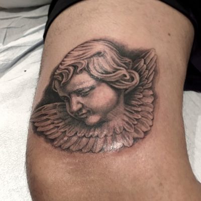 Knee tattoo by Alex Garcia