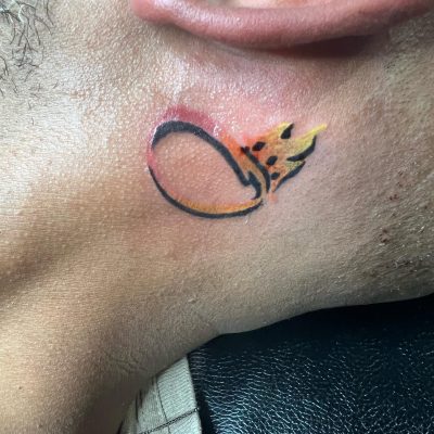 Ear tattoo by Cali