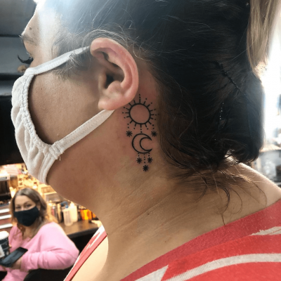 Ear tattoo by Moesha Li