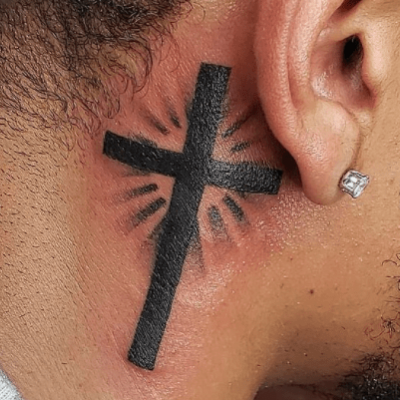 Ear tattoo by Tito Torres