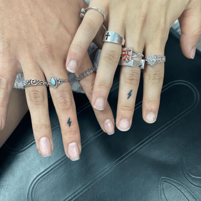 Fingers tattoo by