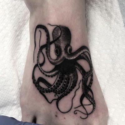 Foot tattoo by Marco Pinedo